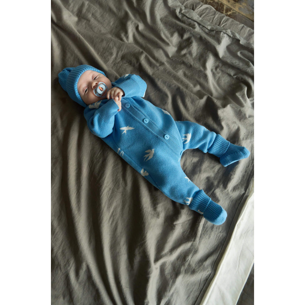 Вязаный комбинезон для малыша, Ласточки на синем